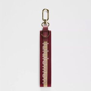 Lululemon Never Lost‎ Keychain Wordmark ColourDeep Luxe/Gold/Bone